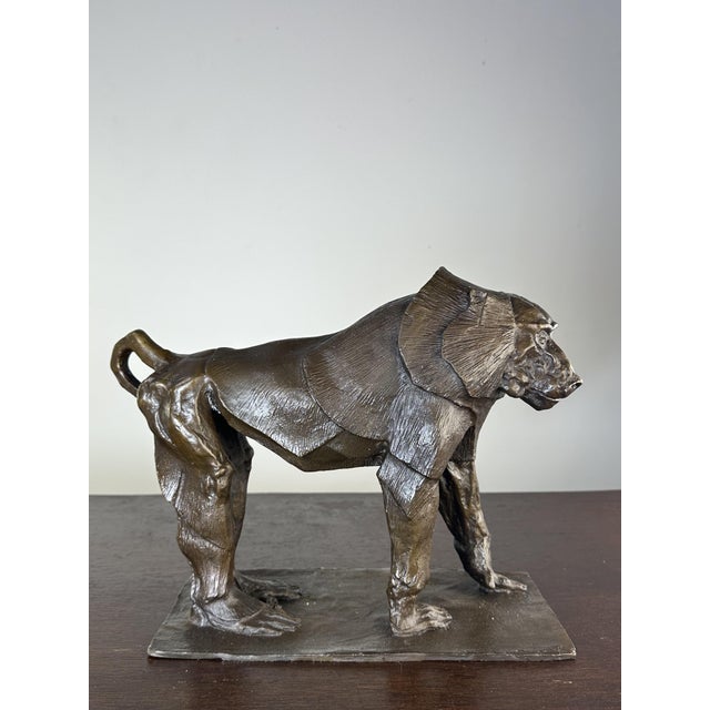 Art Deco style bronze sculpture with a brown patina depicting a walking baboon, a contemporary work from the 2000s, signed...