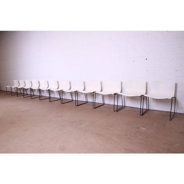 A stylish set of twelve Postmodern stacking "handkerchief" chairs By Massimo Vignelli for Knoll International USA, 1980s...