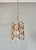 Elegant Palwa pendant lamp in a gold-colored frame with refined crystal glass. This compact yet luxurious lamp is known...