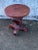Lovely small wooden table. Sturdy does have some weight . A very fashionable stately base. Beautiful with master...