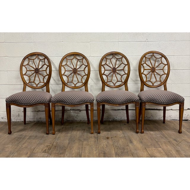 This is an absolutely stunning complete set of four vintage George III Regency Hepplewhite style sunburst, wheel, or...