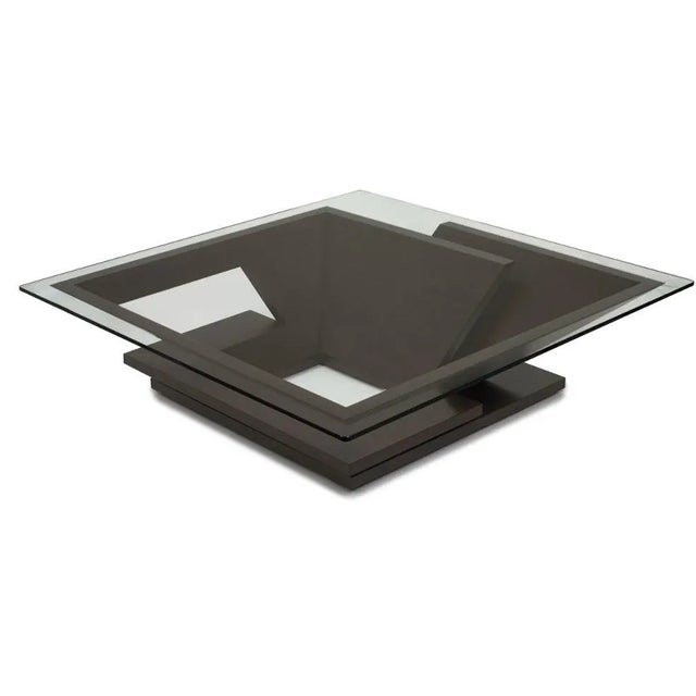 Looking down at a square Nautilus cocktail table is like following a maze. Geometric, strong and muscular, this table is...