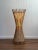 Mid century bamboo floor lamp with an elegant hourglass silhouette and a soft canvas interior shade that gives off a warm,...