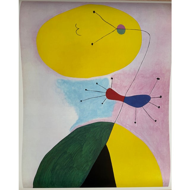 This is a wonderful vintage 1977 art poster featuring Joan Miró’s Portrait (1938), a striking example of the artist’s...