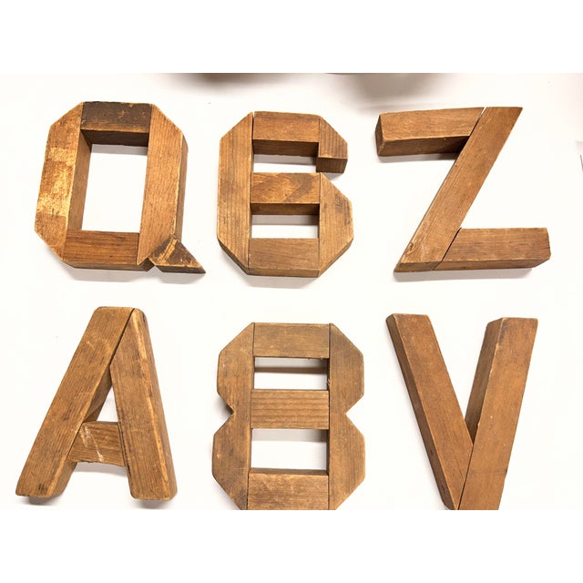 Wonderful vintage wooden letters and numbers, handmade, for a child's room. Q, A, 8, V, Z, and 6 (or 9).