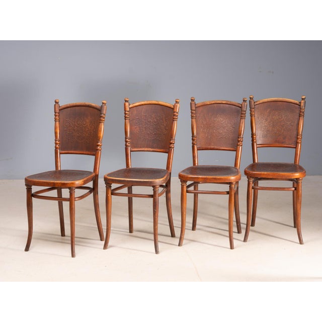 A set of four bentwood chairs produced by jacob & josef kohn (also written j. & j. Kohn), the vienna and moravia based...