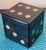 This captivating vintage dice set comprises eight handcrafted wooden dice stored in a cleverly designed matching cubic...