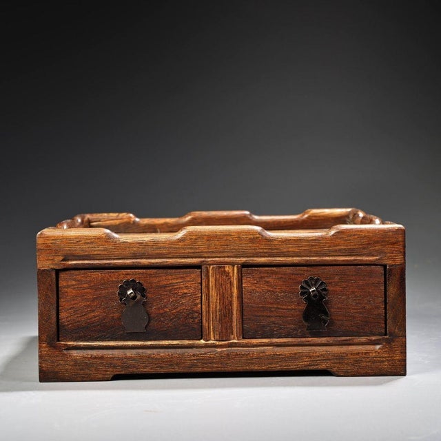 This charming vintage Chinese wooden tea table box is crafted from Huangyang wood, decorated with exquisite mother-of-...
