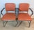 Bring a bold pop of retro industrial charm into your space with this striking matched pair of vintage Goodform armchairs....
