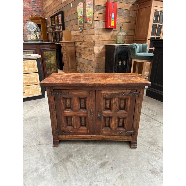 This vintage Brutalist piece of furniture from the 1950s has been fully restored. It features two lockable doors that open...