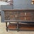This antique English carved oak sideboard with intricate geometric carvings and brass hardware, would look outstanding in...