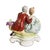 A ceramic figurine of a courting couple. This Victorian piece is created from a crisp white ceramic and features a man and...