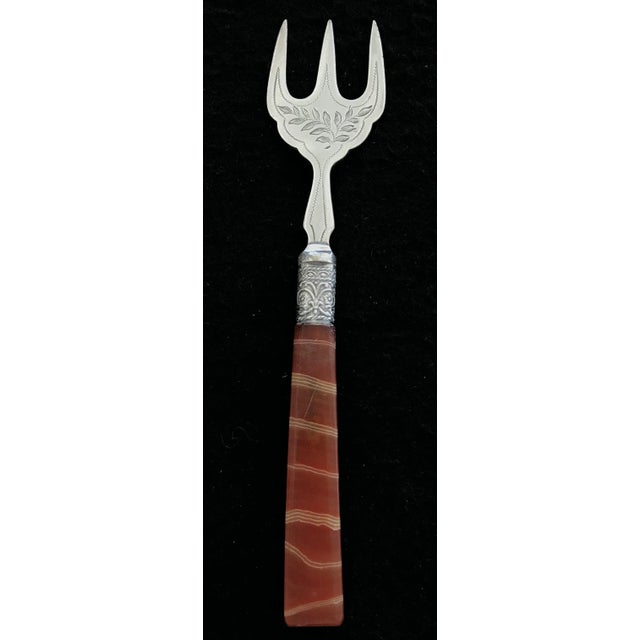 British Bread Fork Silver/Red. Great hostess gift! DETAILS Country: UK Condition: Very Good Year: 1900? Dimensions: H...