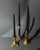 This vintage set of 3 brass candleholders from the 1940s brings together three different shapes, creating a charming and...