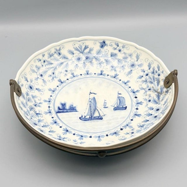 A late 19th century Meissen Porcelain "Kauffahrtei" charger with handle. Excellent hand painted detail of 18th century...