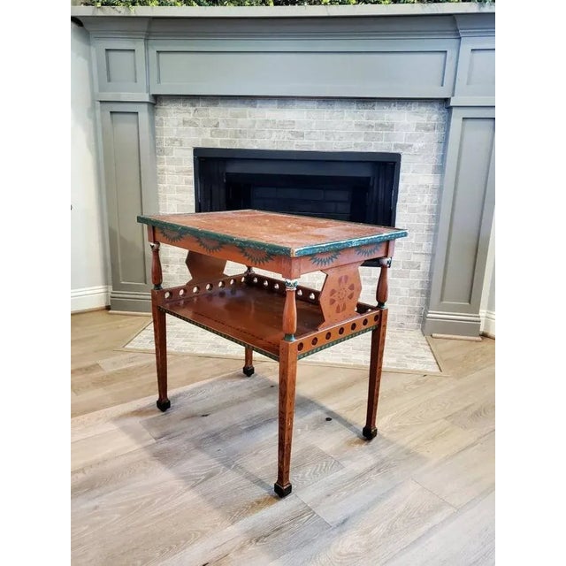 A rare vintage Russian folk art painted serving cart side table, featuring hand carved, painted and laqueured solid wood...