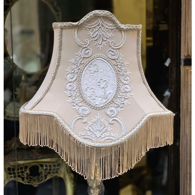 Add an elegant European accent to your interior with this ornate French-style floor lamp, featuring a beautifully sculpted...