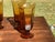 This is a set of four (4) Imperial Glass "Old Williamsburg" amber glasses/goblets. These glasses have been discontinued...