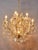 Two-story Theresian chandelier with crystal trimmings. Body made of polished brass. Trims are hand-cut and polished. Lower...