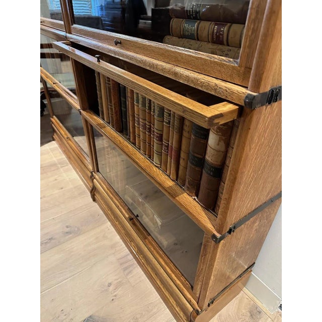 Beautiful antique Globe Wernicke bookcase in light oak color. The cabinet is in perfect condition. Consisting of 6...