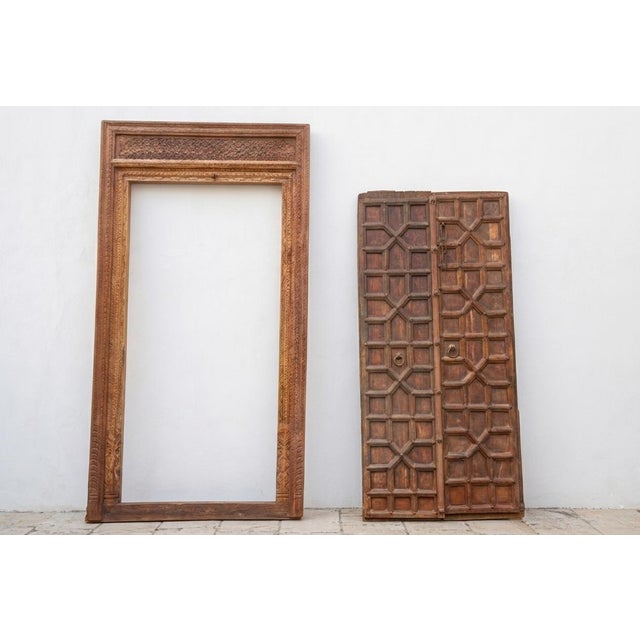 Brown Antique Indian Haveli Portal Carved Teak Door For Sale - Image 8 of 12