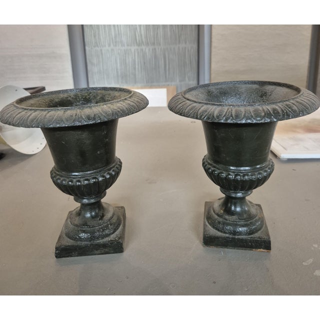 An elegant set of three Medici garden vases, with a classic silhouette inspired by ancient urns. Their balanced design...
