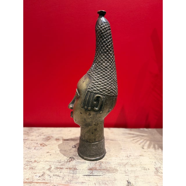 Vintage African head in bronze with intricate detail on all sides. Wonderful accent piece.