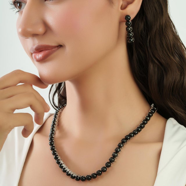 This striking 3-piece Victorian-style jewelry set features an 18-inch tennis necklace paired with coordinating drop...