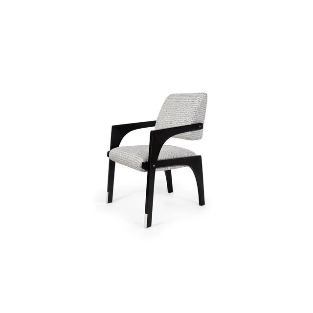 Arches Dining Chair by InsidherLand Dimensions: D 67 x W 59 x H 89 cm. Materials: Black lacquered wooden frame, stainless...