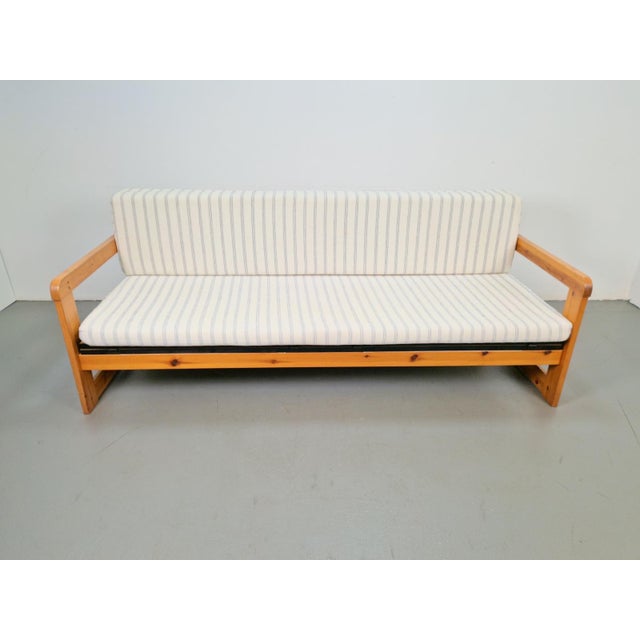 Modern Scandinavian pine sofa bed from the 1970s Dimensions: Height: 199.5 cm, Width: 199.5 cm, Depth: 82 cm, Height: 81...