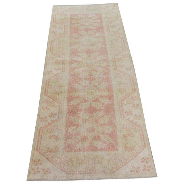 Hand-knotted with care using traditional rug-making techniques, this wool rug blends timeless craftsmanship with a modern...