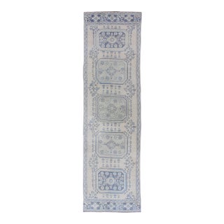 Vintage Turkish Oushak Runner in Faded Blue in Neutral Background For Sale