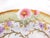 This is an unmarked floral tray with two small cut out handles and dimensional flowers in pink, purple and yellow flowers...