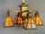 Offering an exceptional antique American Mission/Arts and Crafts chandelier dating to about 1910, and featuring a...