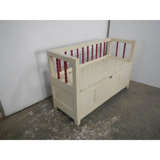 Made of white and red enameled fir wood with a trunk-shaped opening on the seat. The interior is made of natural fir wood....