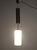 Made in Italy, 1960s. This pendant is made in glazed opaline glass, teak and brass. It is a vintage item, therefore it...