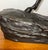 Large and exceptionally heavy cast bronze sculpture depicting a Western rider guiding a horse in motion. The composition...