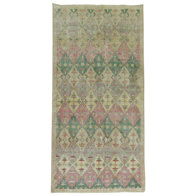Vintage Anatolian runner with repetitive diamond motif throughout in gray, cream, pink and beige accents. Measures: 3'3" x...