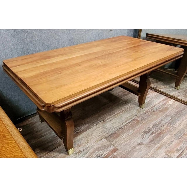 Art Deco dining table in light mahogany, circa 1950 Extension leaves can be added to each end (not included) Decorated...
