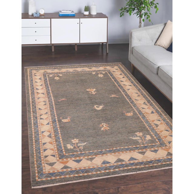 Transform your home's interior with a stunning hand-knotted Gabbeh rug. These rugs are meticulously crafted with bold...
