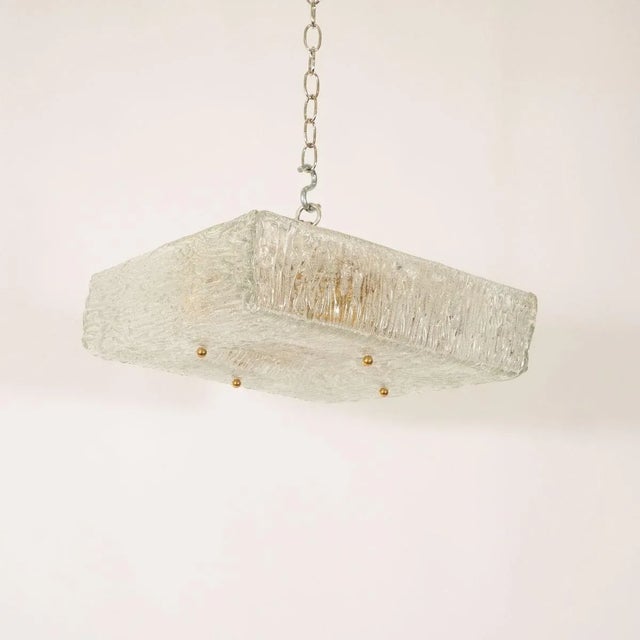 Square textured and molded glass flush mount fixture by Kalmar with brass ball finial details.