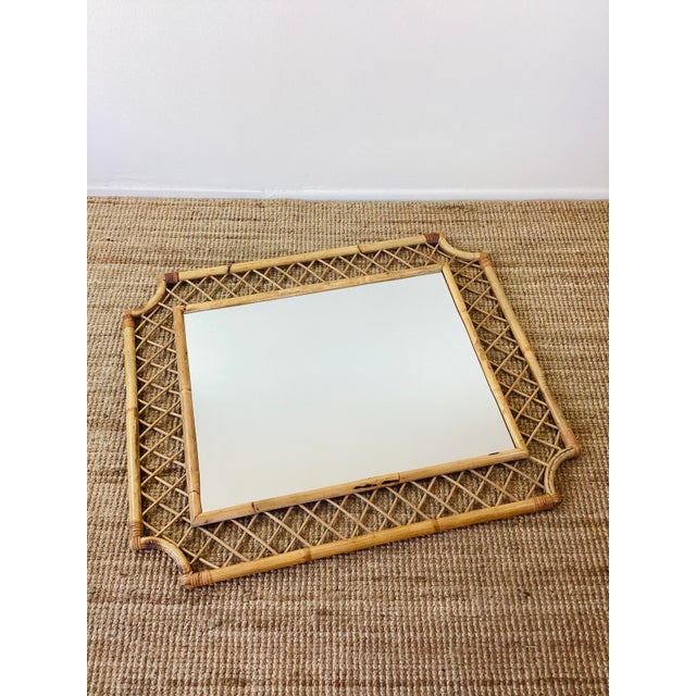 Vintage Rattan / Bamboo Wall Mirror made of a bamboo / rattan material natural color thick rattan frame with small reed...