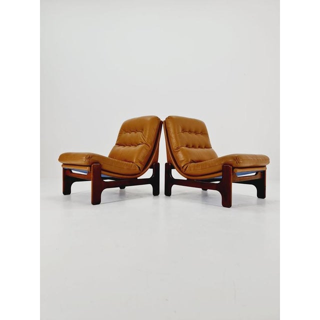1 of 2 mid century armchairs in leather and walnut wood , Sweden 1960s The beautiful armchair is very comfortable and...