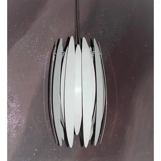 Scandinavian hanging lamp Benny Frandsen, the 1980s was made of metal, is preserved in very good condition and requires a...