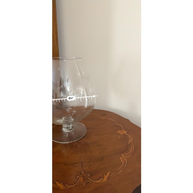 This is a Princess House Heritage pattern hand-blown crystal pitcher. It features a hand-etched floral design. It has a...