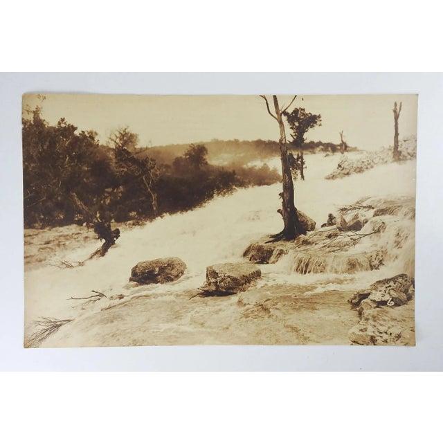 Vintage circa 1917 seipia toned photograph of river flood. Unsigned. Unframed, corner creasing.