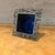 For your consideration, a picture frame with intricate floral and vine design, this vintage-style picture frame is likely...