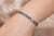 This is part of Chairish’s Fine Jewelry assortment. This 18.5 ct Blue Topaz Tennis Bracelet in 18K gold showcases 25...