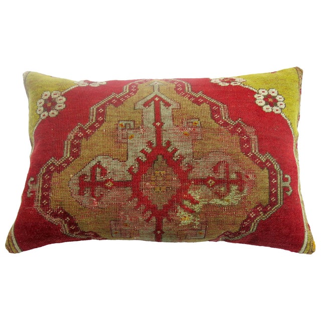 Large Pillow made from a vintage Turkish rug. Red, brown, green accents. 18'' x 28''