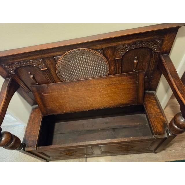 Antique Oak Hall Bench Features Intricate Carvings and a Circular Cane Insert in the Backrest, Late 19th Century For Sale - Image 9 of 9
